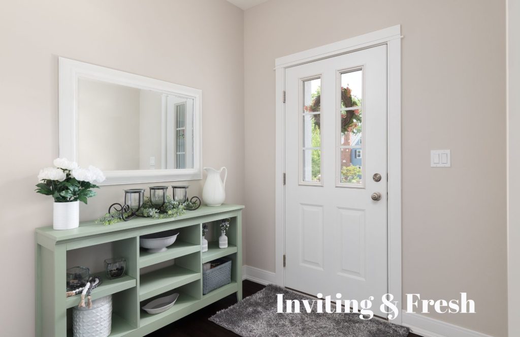neutral entryway
green console table